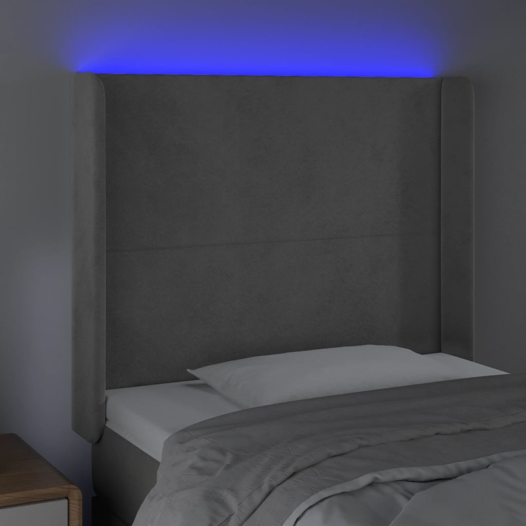 sengegavl med LED-lys 83x16x118/128 cm fløjl lysegrå