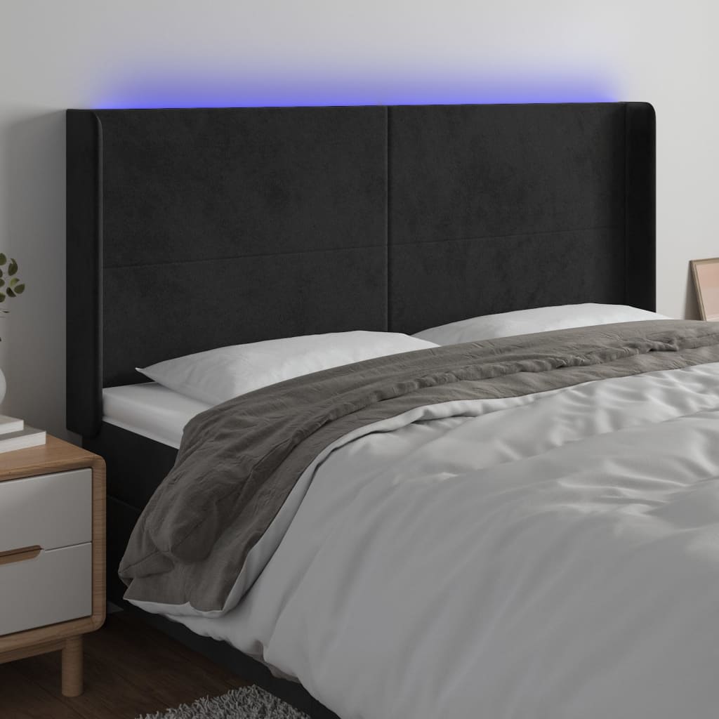 sengegavl med LED-lys 203x16x118/128 cm fløjl sort