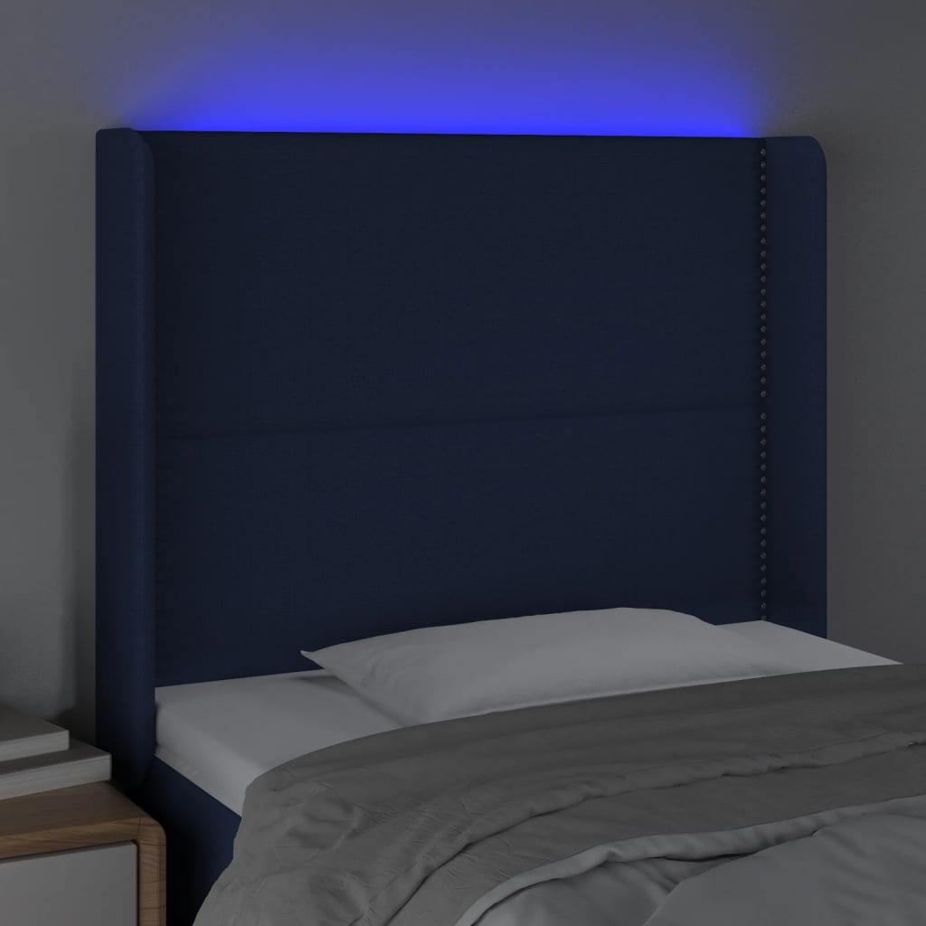 sengegavl med LED-lys 93x16x118/128 cm stof blå