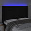 sengegavl med LED-lys 147x16x118/128 cm stof sort