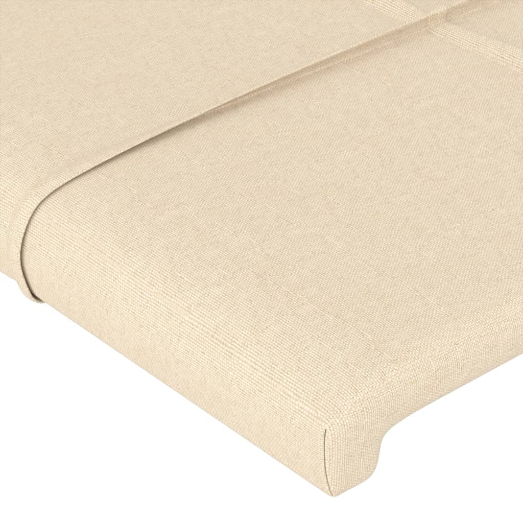 sengegavl med LED-lys 163x16x118/128 cm stof cremefarvet