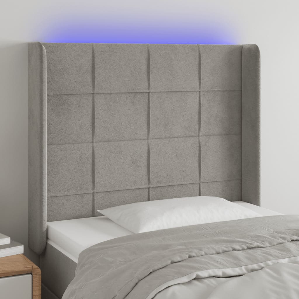sengegavl med LED-lys 103x16x118/128 cm fløjl lysegrå