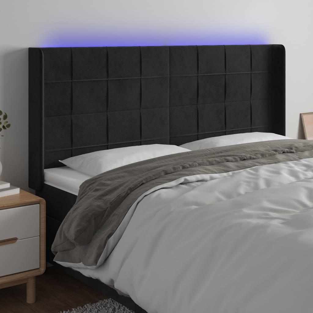 sengegavl med LED-lys 163x16x118/128 cm fløjl sort