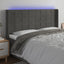 sengegavl med LED-lys 203x16x118/128 cm fløjl mørkegrå