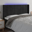 sengegavl med LED-lys 203x16x118/128 cm fløjl sort