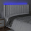 sengegavl med LED-lys 147x16x118/128 cm kunstlæder hvid
