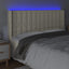 sengegavl med LED-lys 163x16x118/128 cm kunstlæder cremefarvet