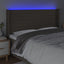 sengegavl med LED-lys 163x16x118/128 cm stof gråbrun