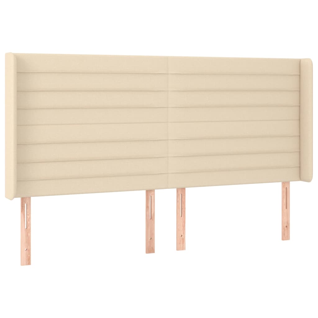 sengegavl med LED-lys 183x16x118/128 cm stof cremefarvet