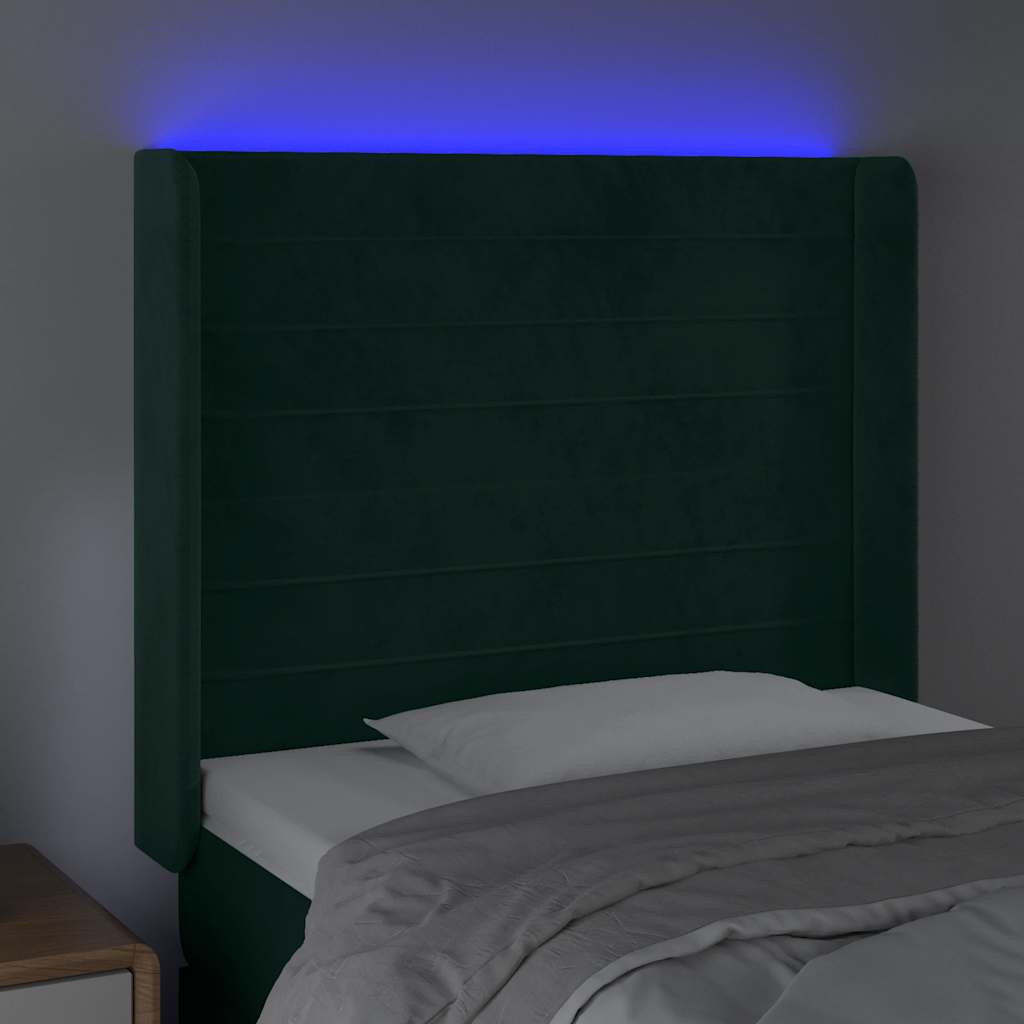sengegavl med LED-lys 103x16x118/128 cm fløjl mørkegrøn