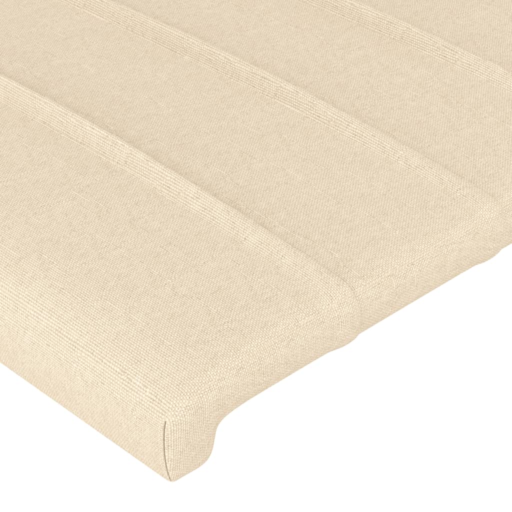 sengegavl med LED-lys 163x16x118/128 cm stof cremefarvet