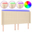 sengegavl med LED-lys 183x16x118/128 cm stof cremefarvet