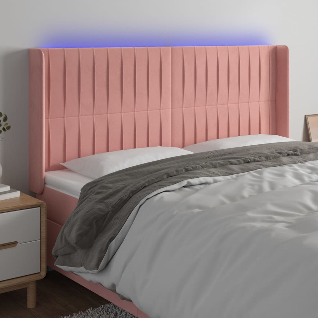 sengegavl med LED-lys 163x16x118/128 cm fløjl lyserød