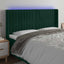 sengegavl med LED-lys 203x16x118/128 cm fløjl mørkegrøn