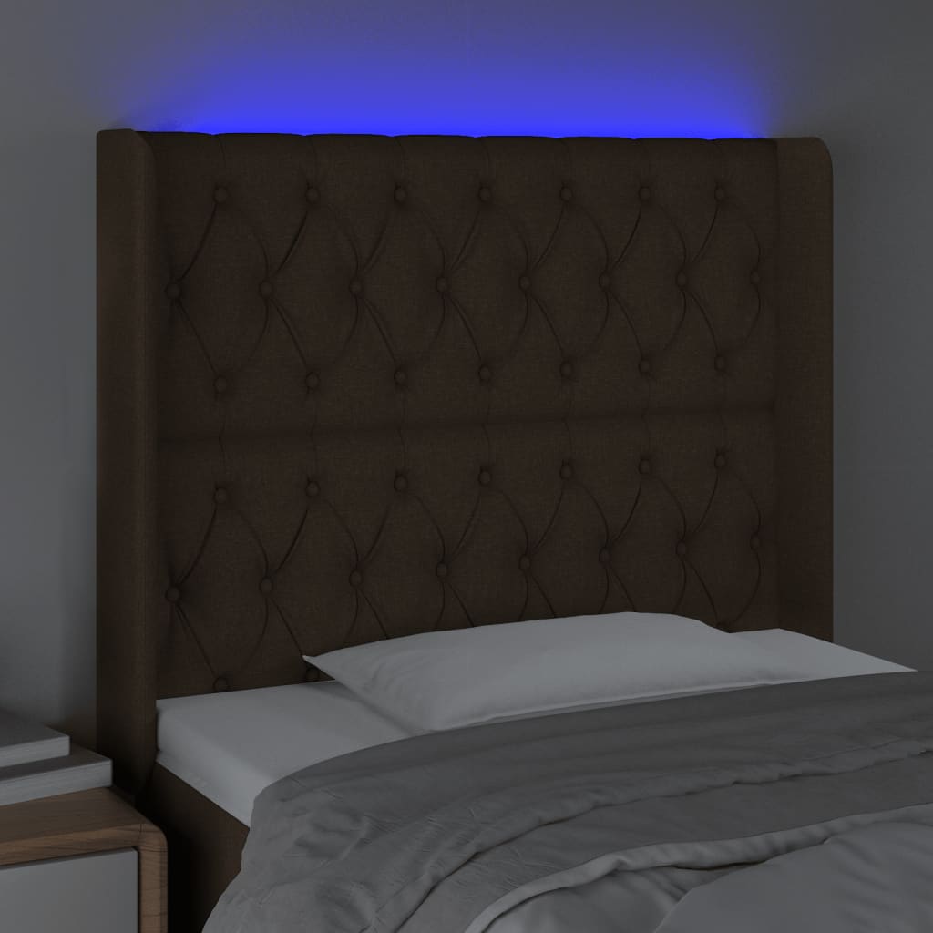 sengegavl med LED-lys 93x16x118/128 cm stof mørkebrun
