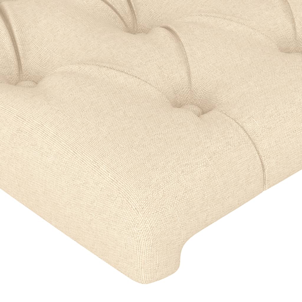 sengegavl med LED-lys 147x16x118/128 cm stof cremefarvet