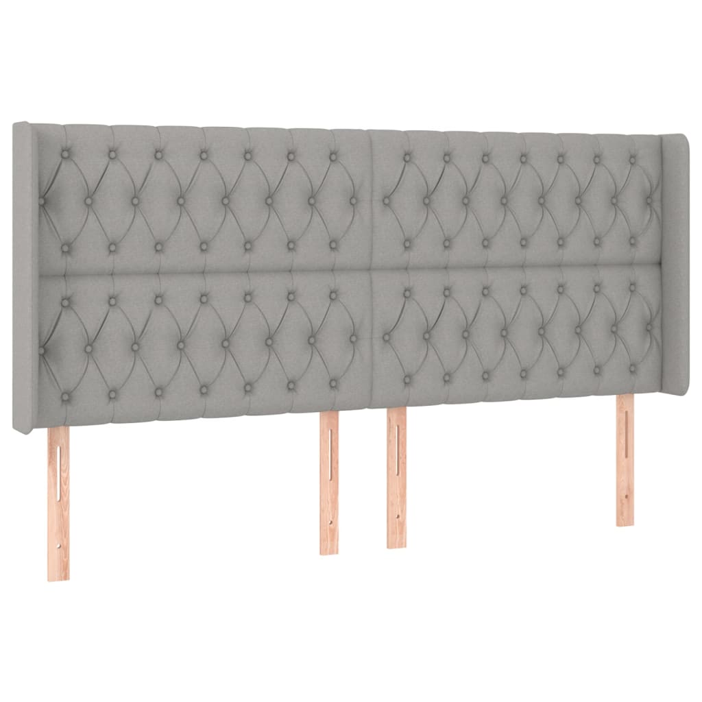 sengegavl med LED-lys 183x16x118/128 cm stof lysegrå