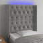 sengegavl med LED-lys 83x16x118/128 cm fløjl lysegrå