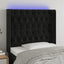 sengegavl med LED-lys 103x16x118/128 cm fløjl sort