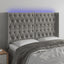 sengegavl med LED-lys 147x16x118/128 cm fløjl lysegrå