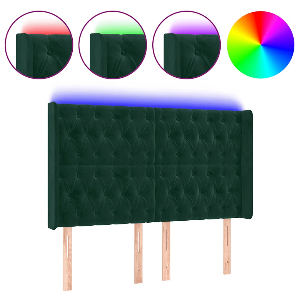 sengegavl med LED-lys 147x16x118/128 cm fløjl mørkegrøn