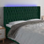 sengegavl med LED-lys 183x16x118/128 cm fløjl mørkegrøn