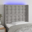 sengegavl med LED-lys 83x16x118/128 cm stof lysegrå