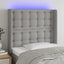 sengegavl med LED-lys 93x16x118/128 cm stof lysegrå