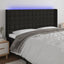 sengegavl med LED-lys 163x16x118/128 cm stof sort