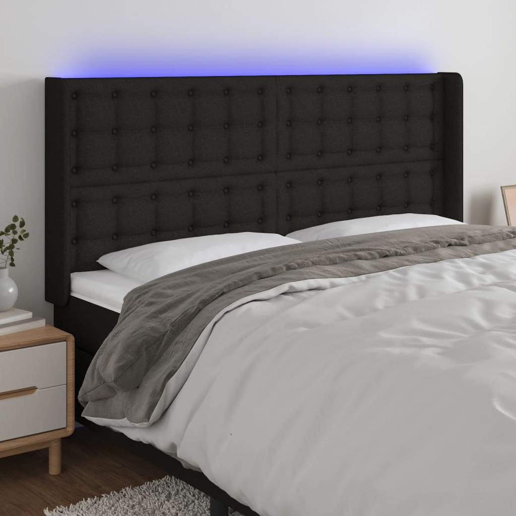 sengegavl med LED-lys 183x16x118/128 cm stof sort
