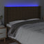 sengegavl med LED-lys 183x16x118/128 cm stof mørkebrun