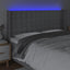 sengegavl med LED-lys 203x16x118/128 cm stof lysegrå