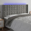 sengegavl med LED-lys 203x16x118/128 cm fløjl lysegrå