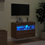 væghængt tv-bord med LED-lys 60x30x40 cm brun egetræsfarve