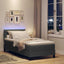 Box spring seng med LED-lysstrimler Mørkegrå 90 x 200 cm Stof