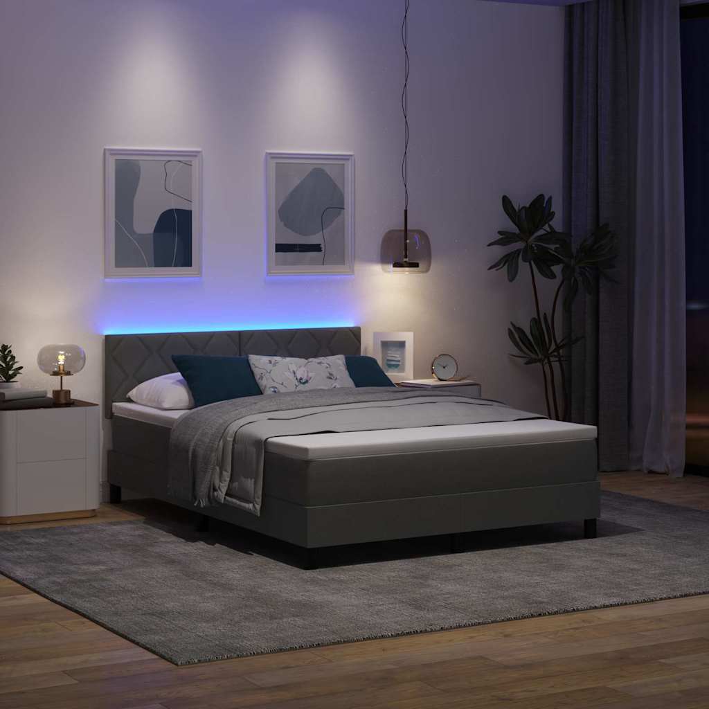 Box spring seng med LED-lysstrimler Mørkegrå 140 x 200 cm Stof