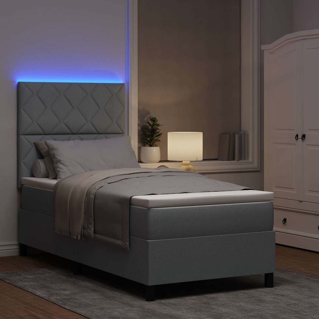 Box spring seng med LED-lysstrimler Lysegrå 90 x 200 cm Stof