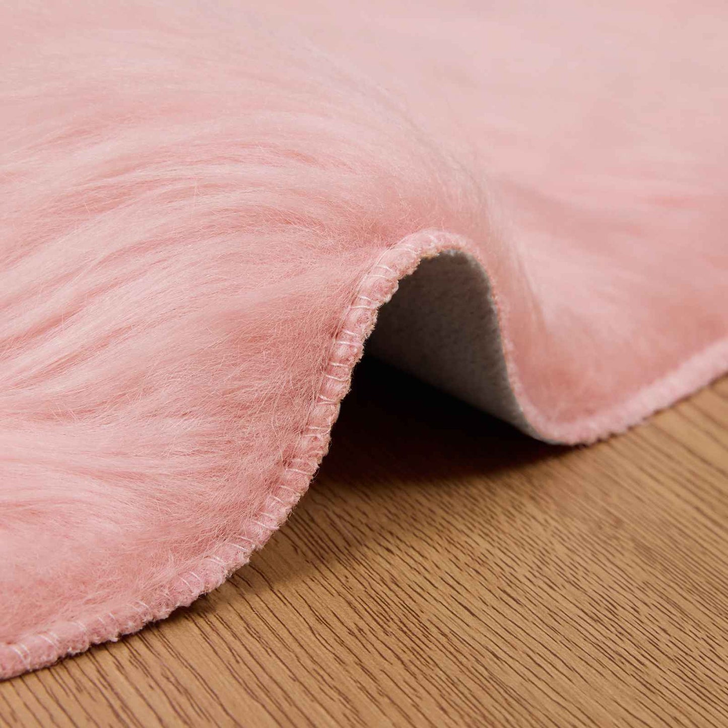 Fuskobbel lammeskindstæppe TAFALLA Lyserød Ø 100 cm Polyester