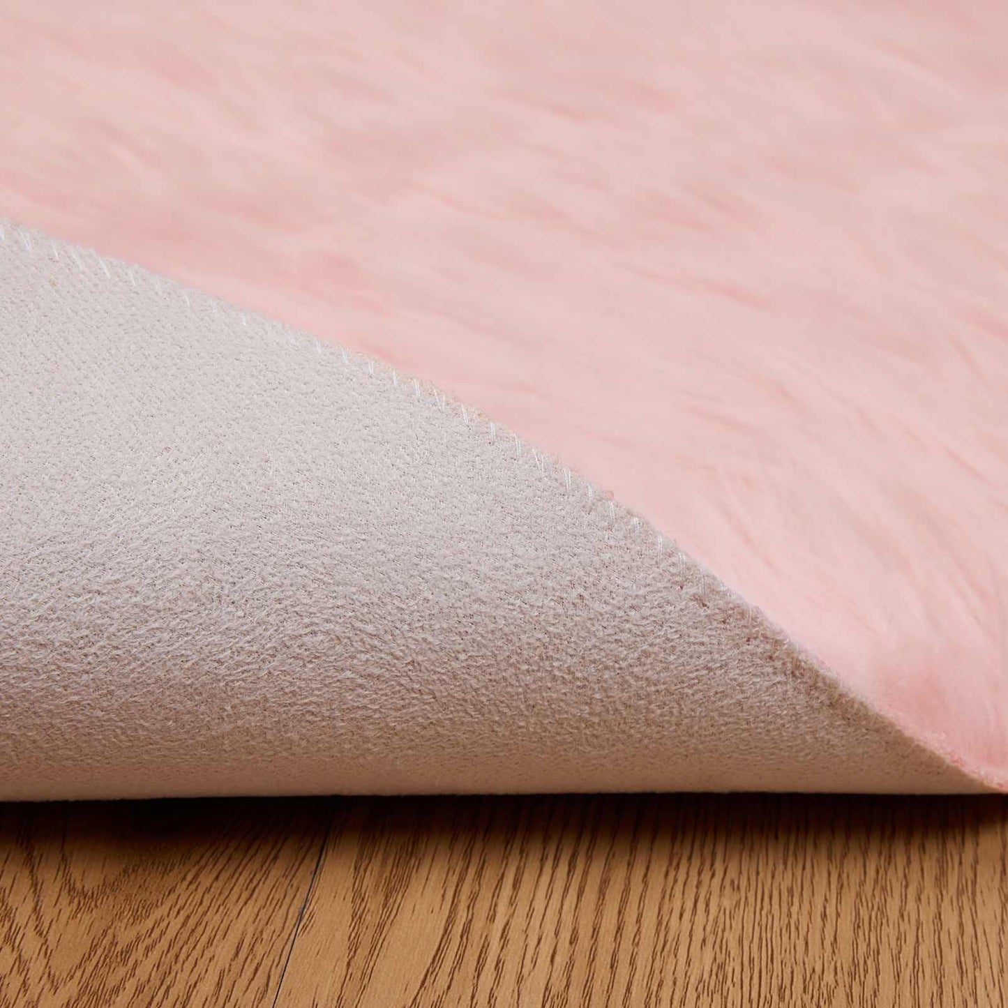 Fuskobbel lammeskindstæppe TAFALLA Lyserød Ø 200 cm Polyester