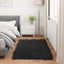 Fuskobbel lammeskindstæppe TAFALLA Sort 60 x 110 cm Polyester