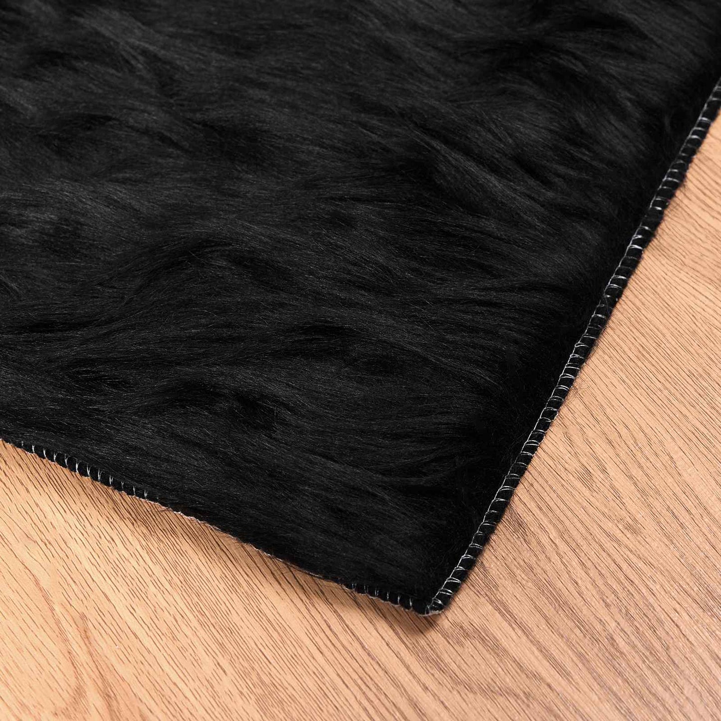 Fuskobbel lammeskindstæppe TAFALLA Sort 120 x 170 cm Polyester