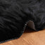 Fuskobbel lammeskindstæppe TAFALLA Sort 60 x 90 cm Polyester