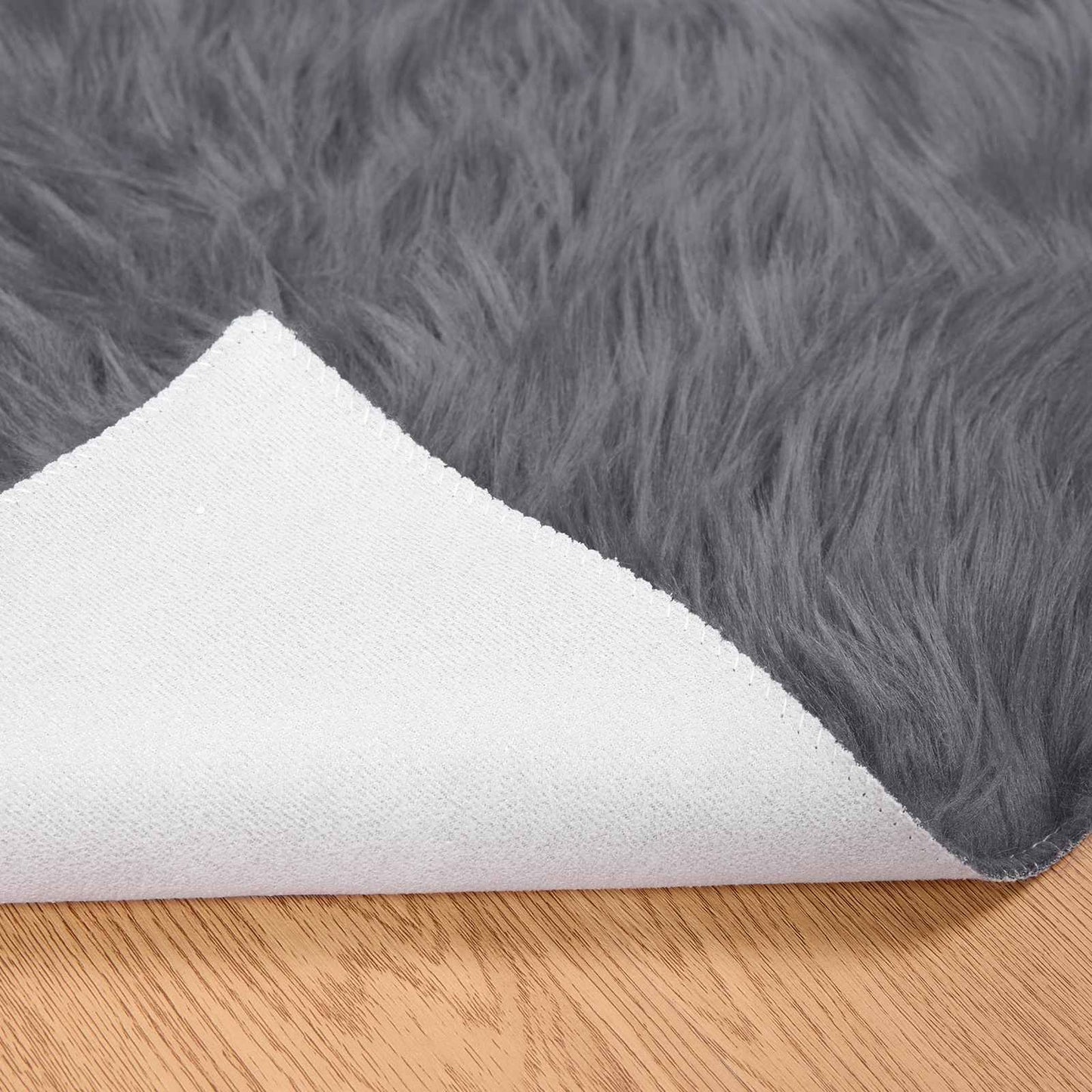 Fuskobbel lammeskindstæppe TAFALLA Antracit 80 x 250 cm