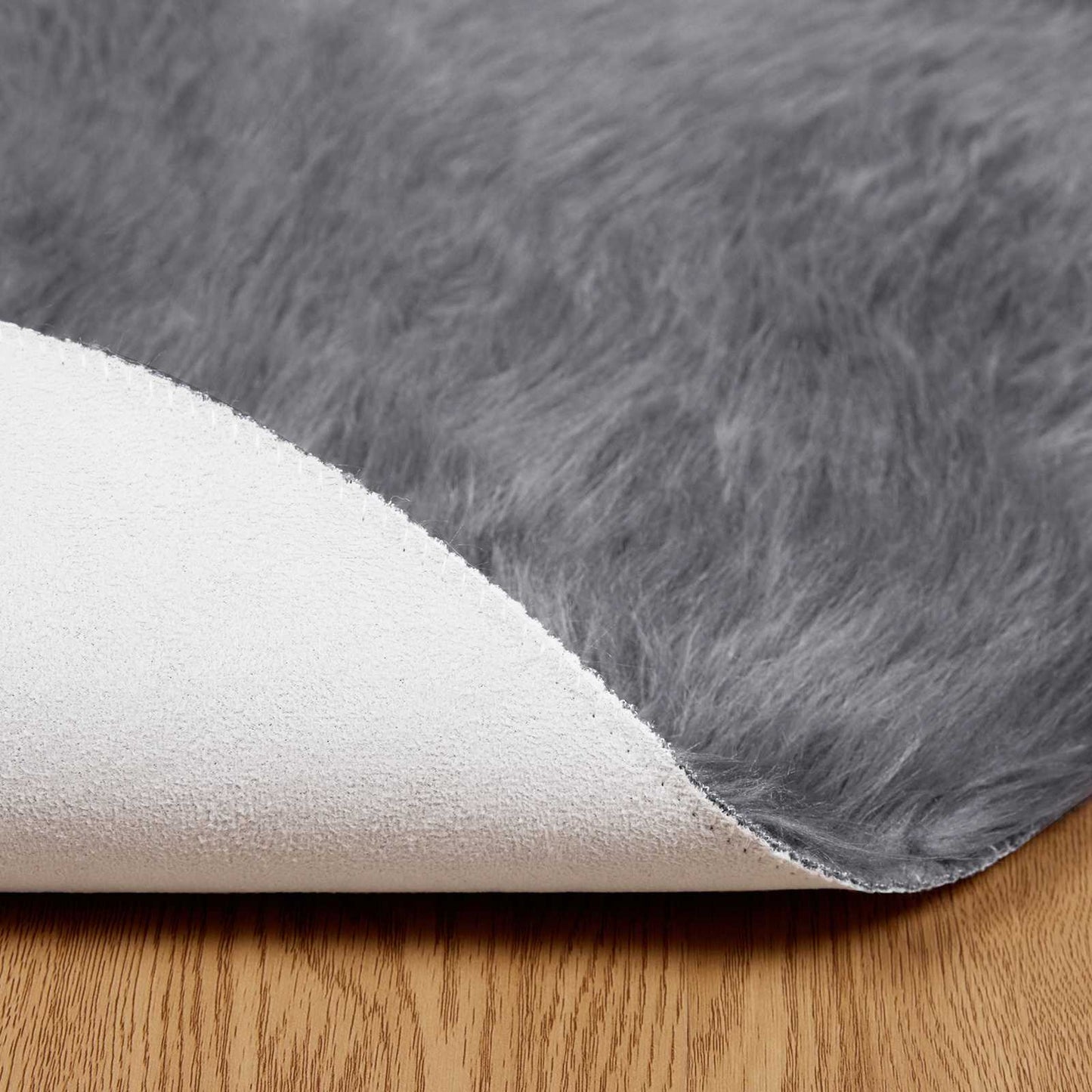 Fuskobbel lammeskindstæppe TAFALLA Antracit Ø 160 cm Polyester