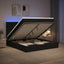 Ottoman seng med madras og LED Sort 140 x 200 cm Stof